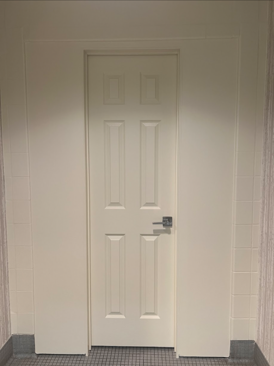 Finished interior door with clean trim and fresh paint